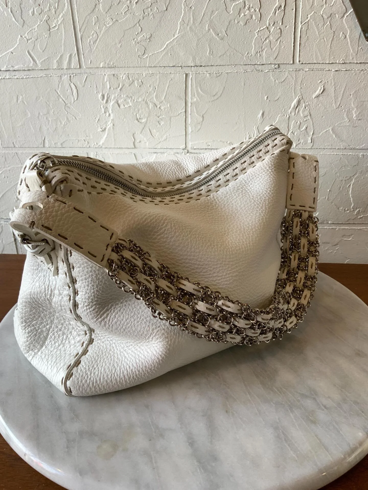 We don&rsquo;t get white leather handbags in often and these two are FAB! You can find them both online now and in the shop (come on by!)

1. Selleria White leather shoulder bag with chain strap $650
2. Longchamp Legende white patent doctors bag $195