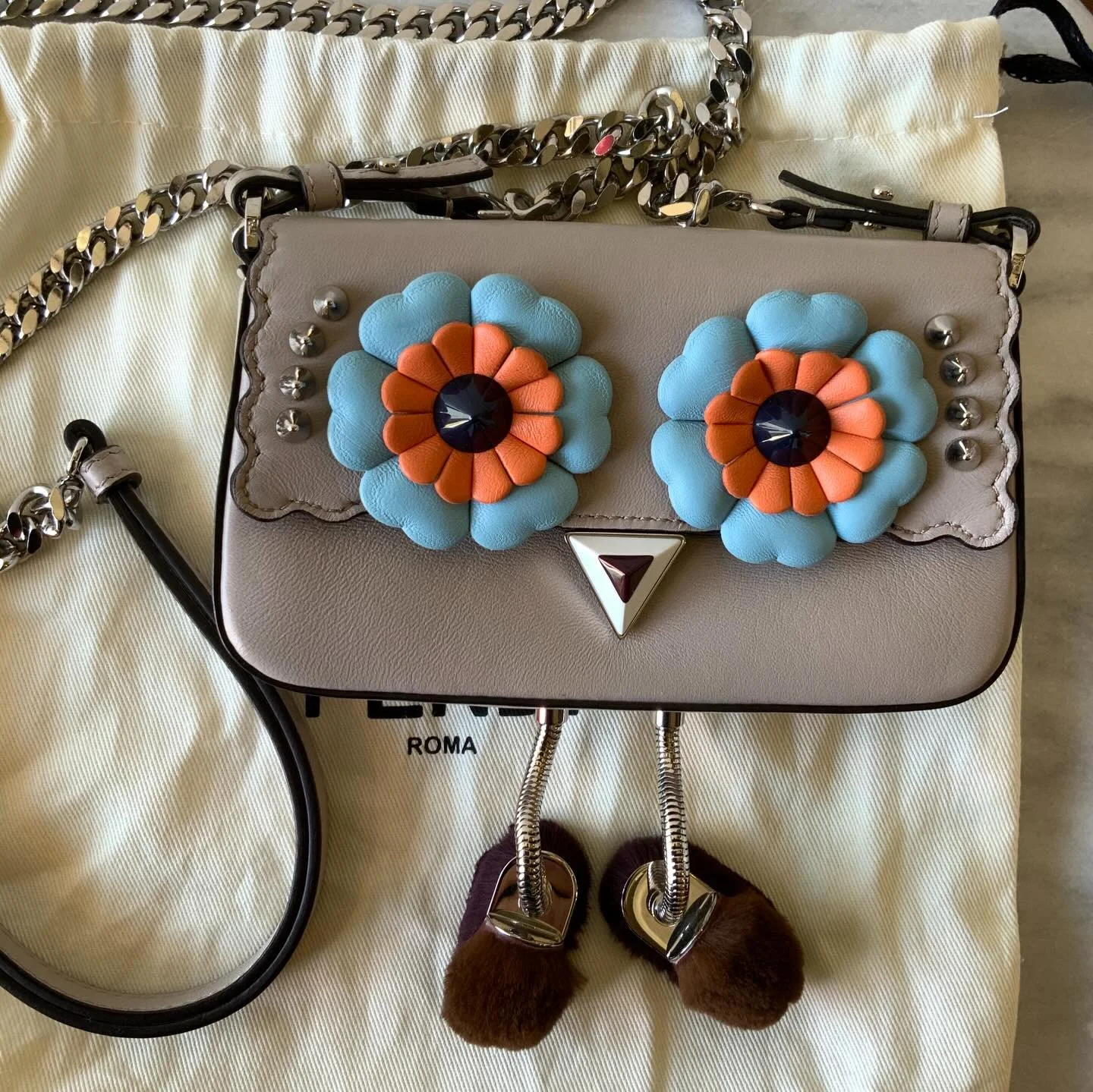 If you are still looking for a Valentine, look no further! This lil cutie just waltzed through the door and asked if you were available. How absurdly cute is this mini monster bag from F e n d i ?!! Do you see those furry little feet?! 

Available in