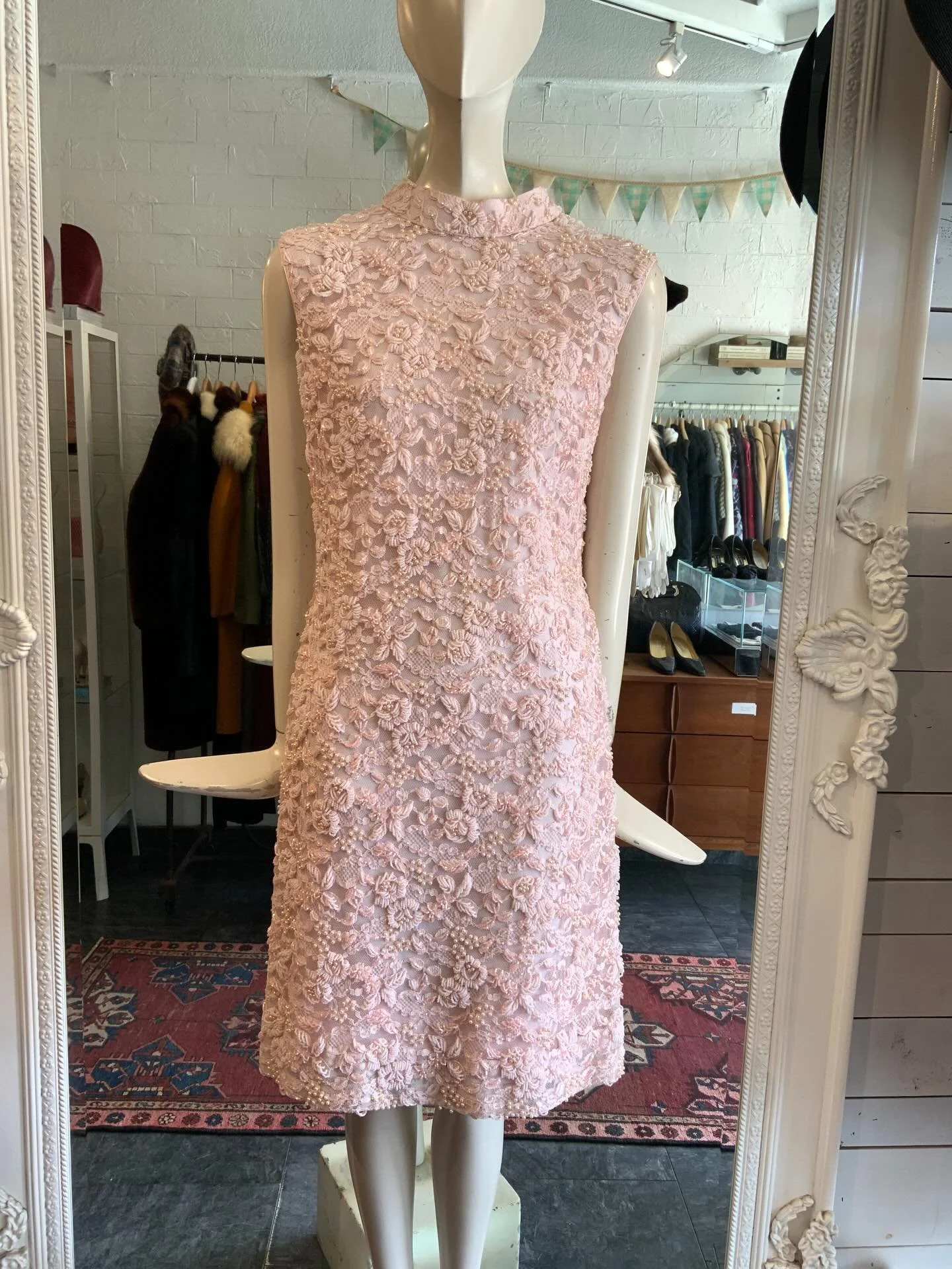 This spectacular hand beaded baby pink cocktail dress was just added to the Etsy Shop ( and shop floor, too, of course). These 1950s hand beaded cocktail dress are so special - they are true works of art.

She fits a size small - all measurements and