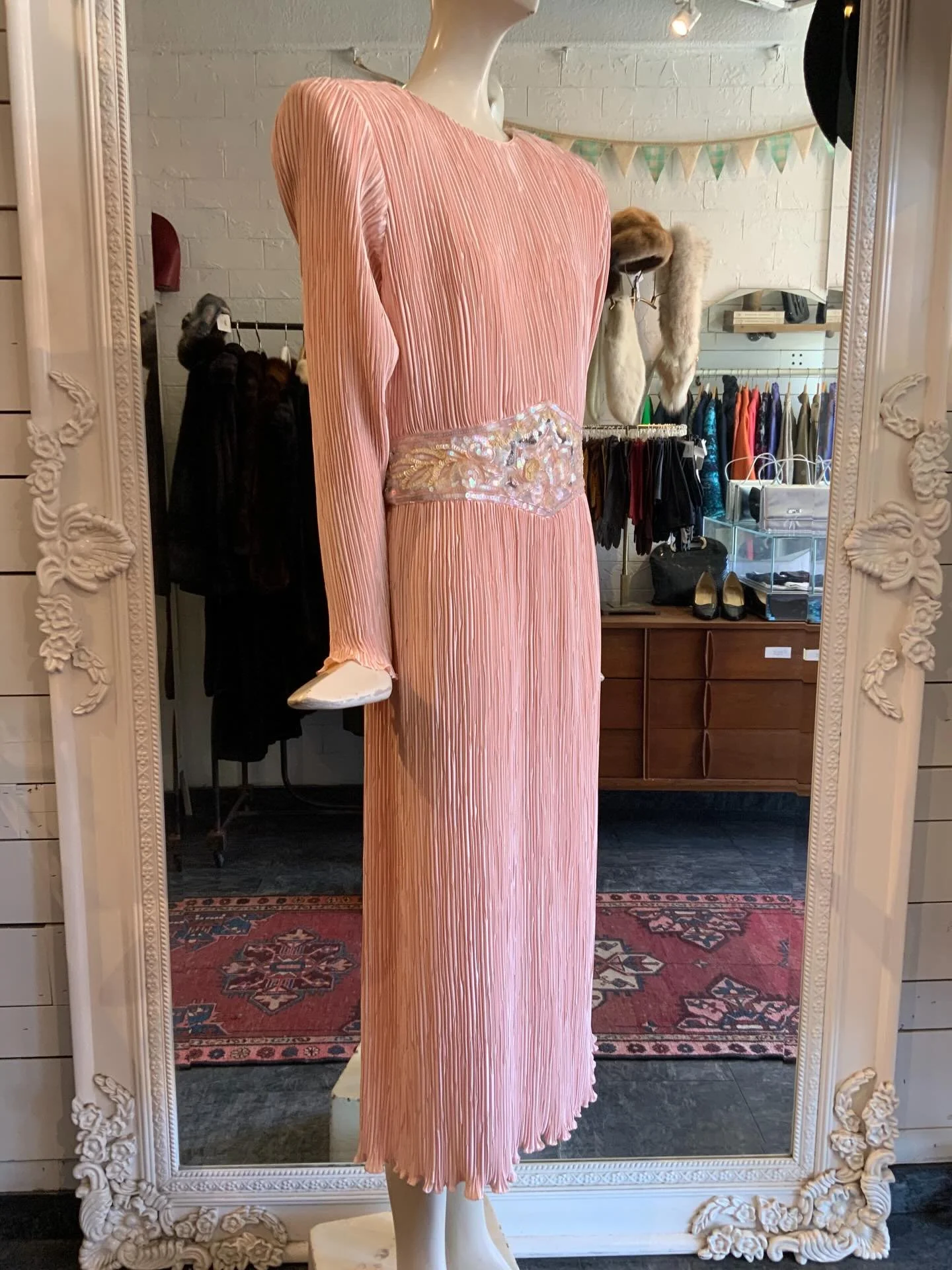 Our recent estate came with many stunning gowns, including this pink pleated Grecian inspired beauty. We are working on getting them listed on the website, but because there are so many, it will be a process. In the mean time, keep an eye on our stor