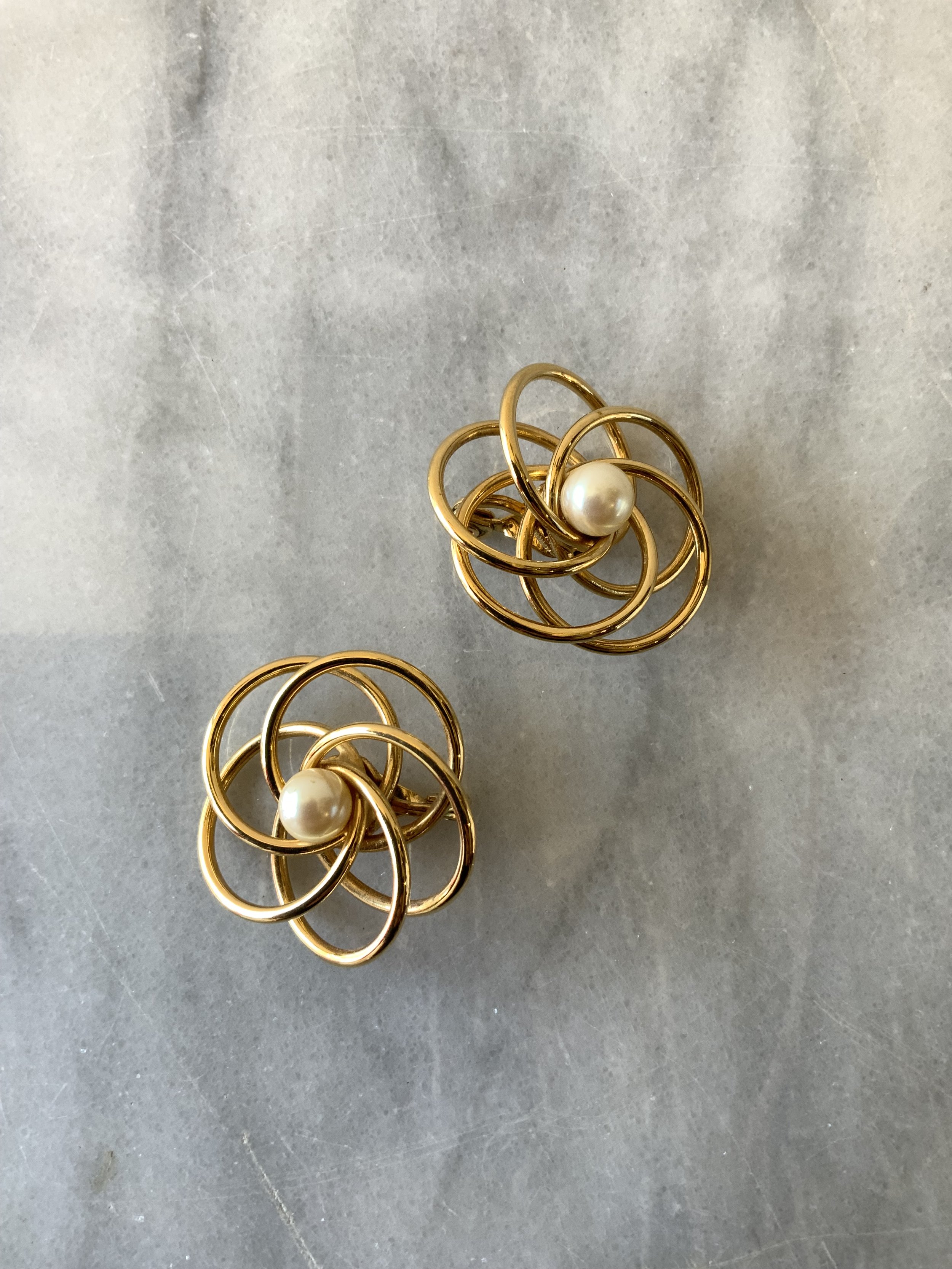 Gold Atomic Swirl Floral Clip on Earrings