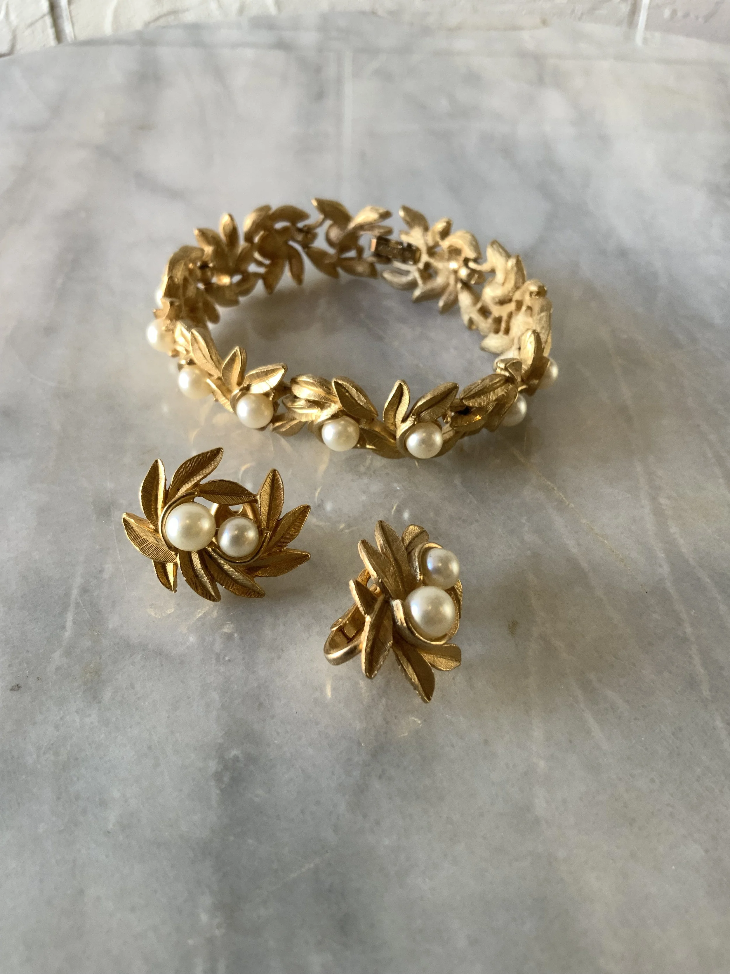 1970s Avon gold leaf pearl bracelet and earrings