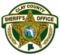 Seal of the Clay County Sheriff's Office with a gold star, a map of Mississippi, and the state of Mississippi, featuring green, gold, and white colors.