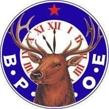 A clock with a reindeer head and antlers in front of it, with the words 'BOPE' and Roman numerals around the clock face.