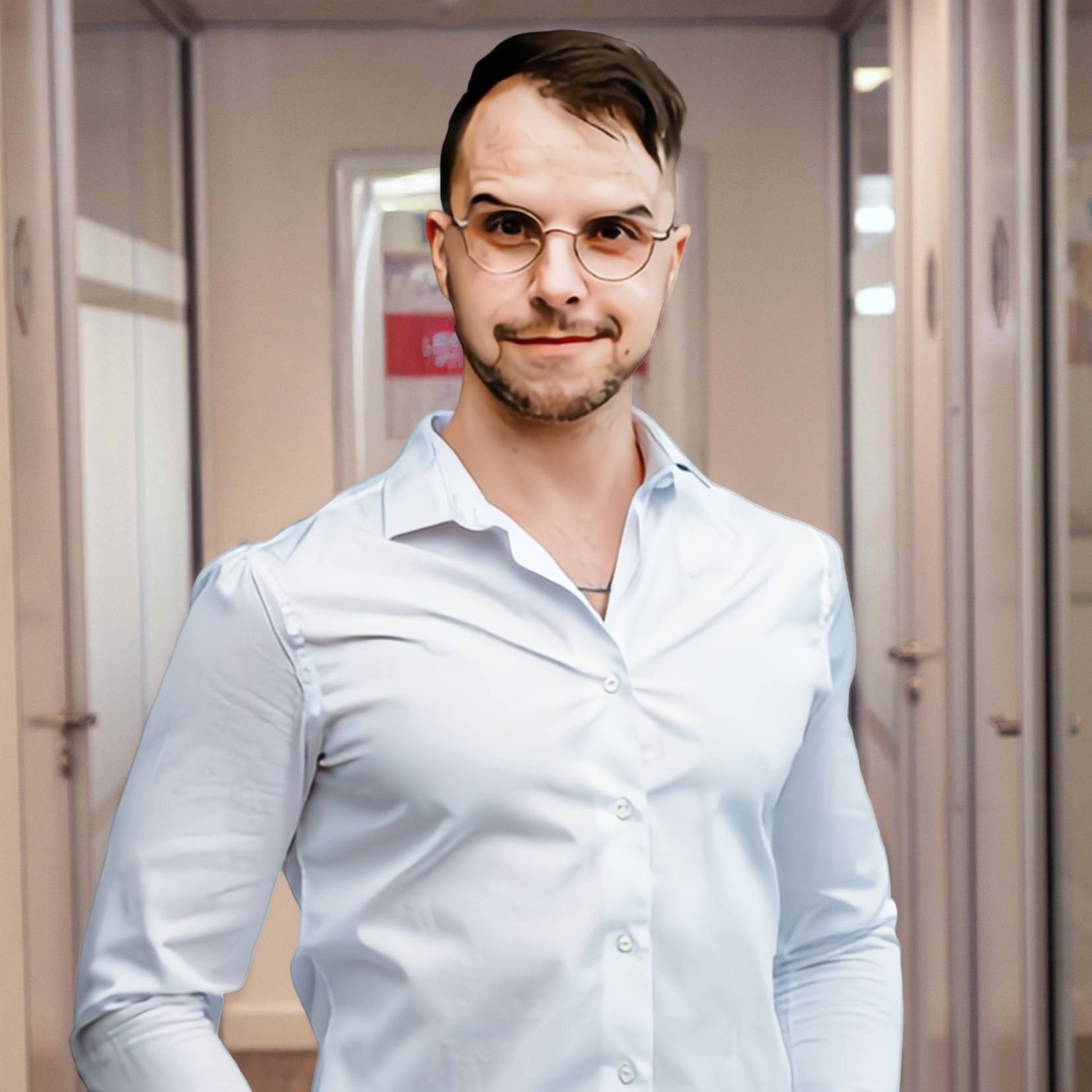 Person wearing glasses and a white shirt, smiling slightly, with a white background.