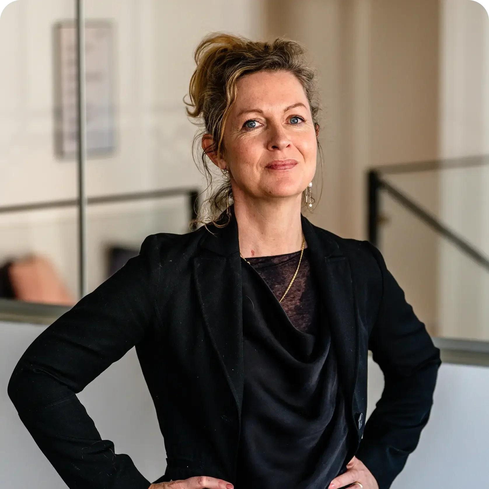 CEO of Open, standing against a plain background.