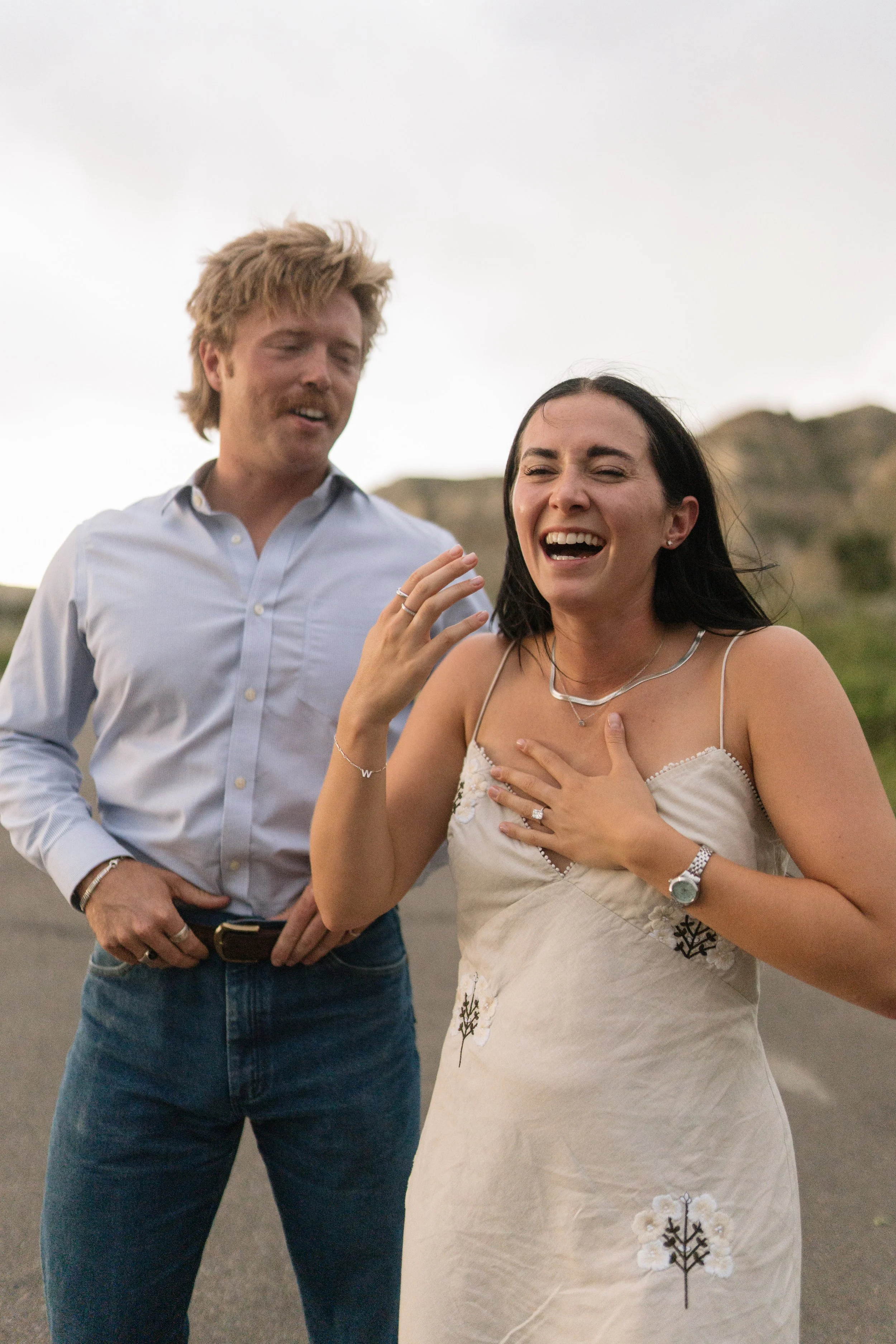 Medora North Dakota engagement session couple laughing outdoors photographed by Aesthete Pix