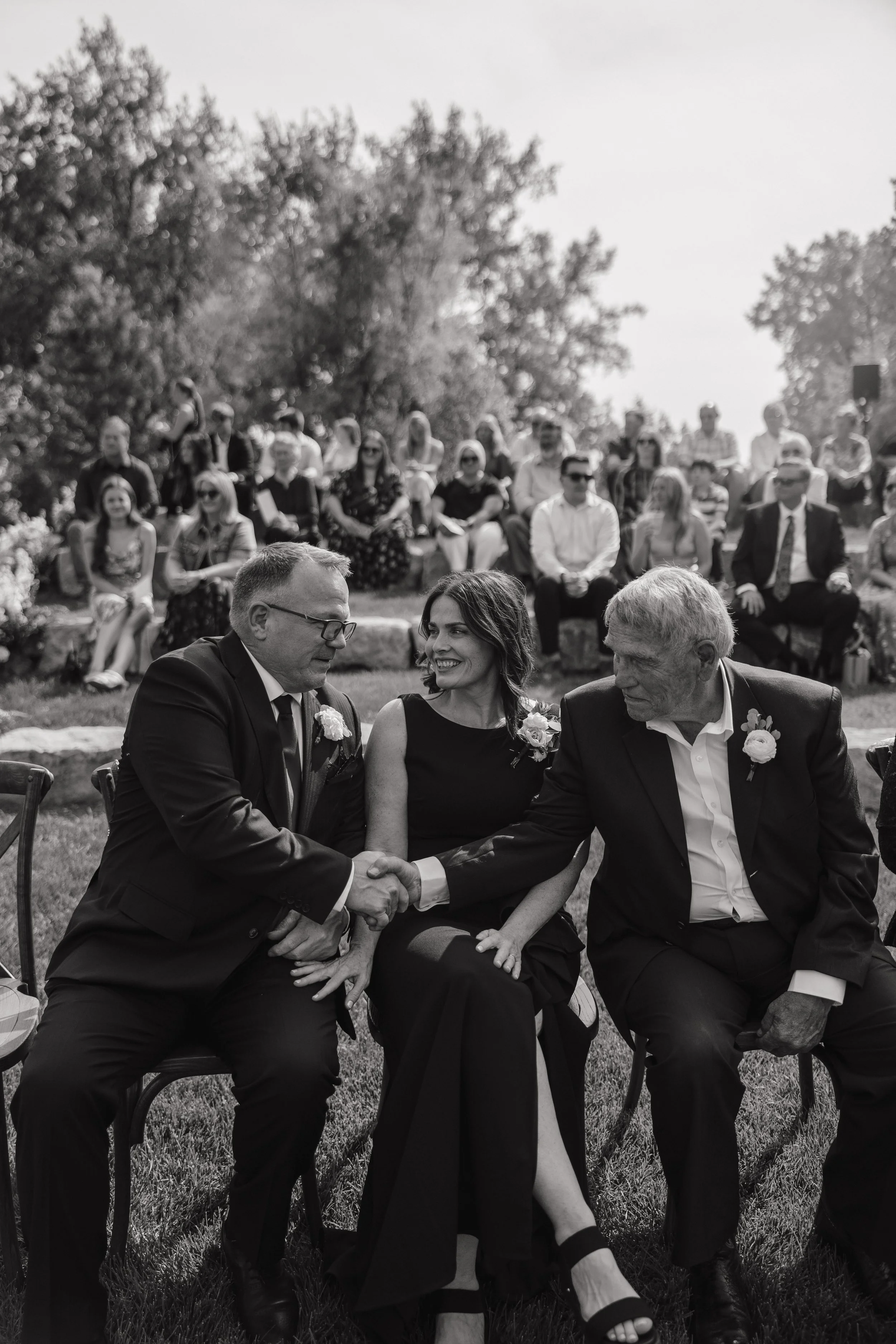 Outdoor wedding ceremony guests in Fargo North Dakota photographed by Aesthete Pix