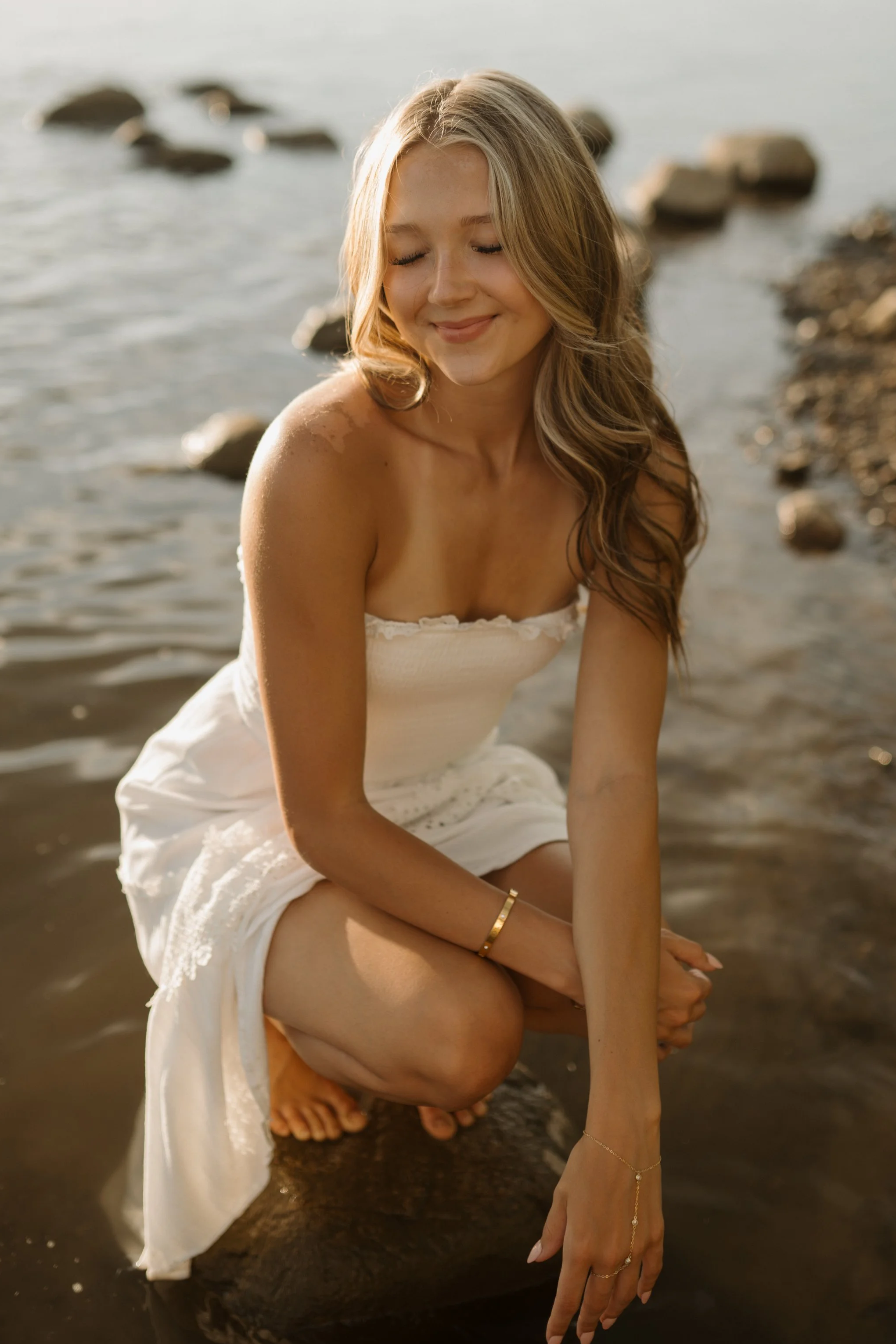 Bismarck North Dakota senior portrait session by river at sunset photographed by Aesthete Pix