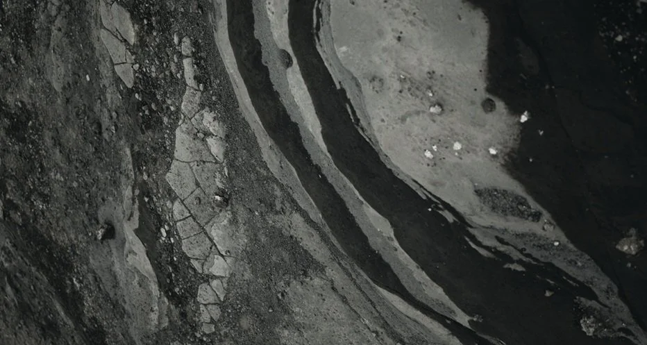 Close-up of black coal or charcoal pieces.