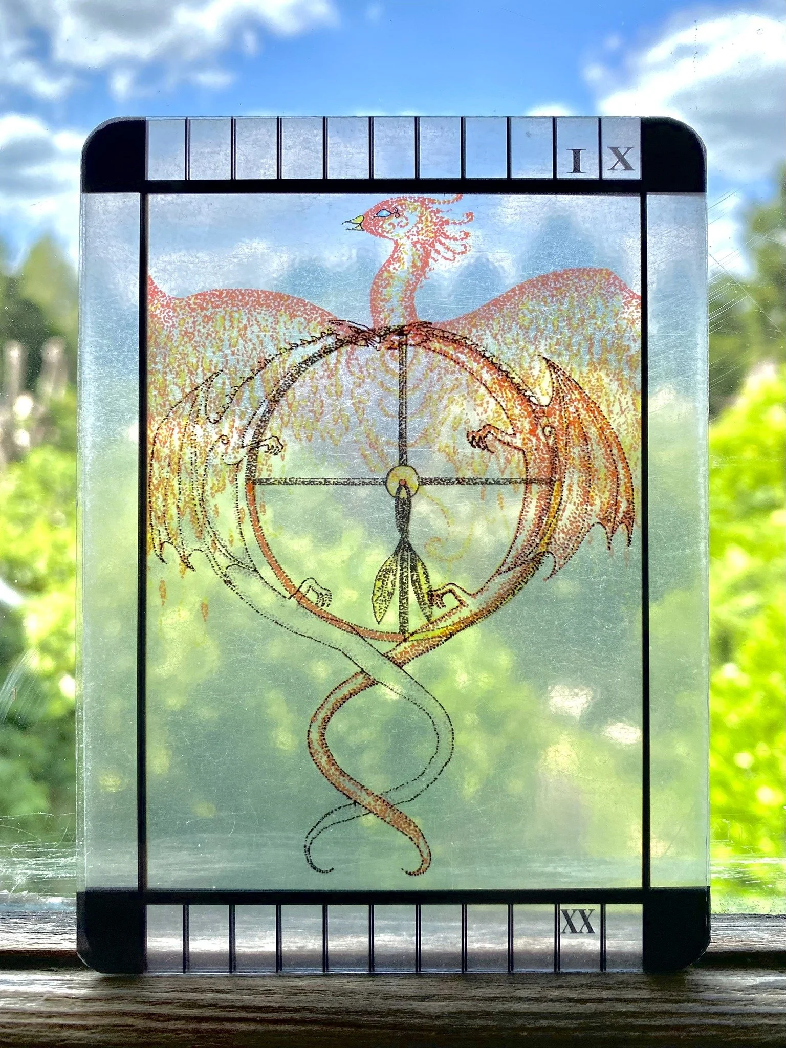 A transparent Tarot card - The Magician, Judgement and The Wheel