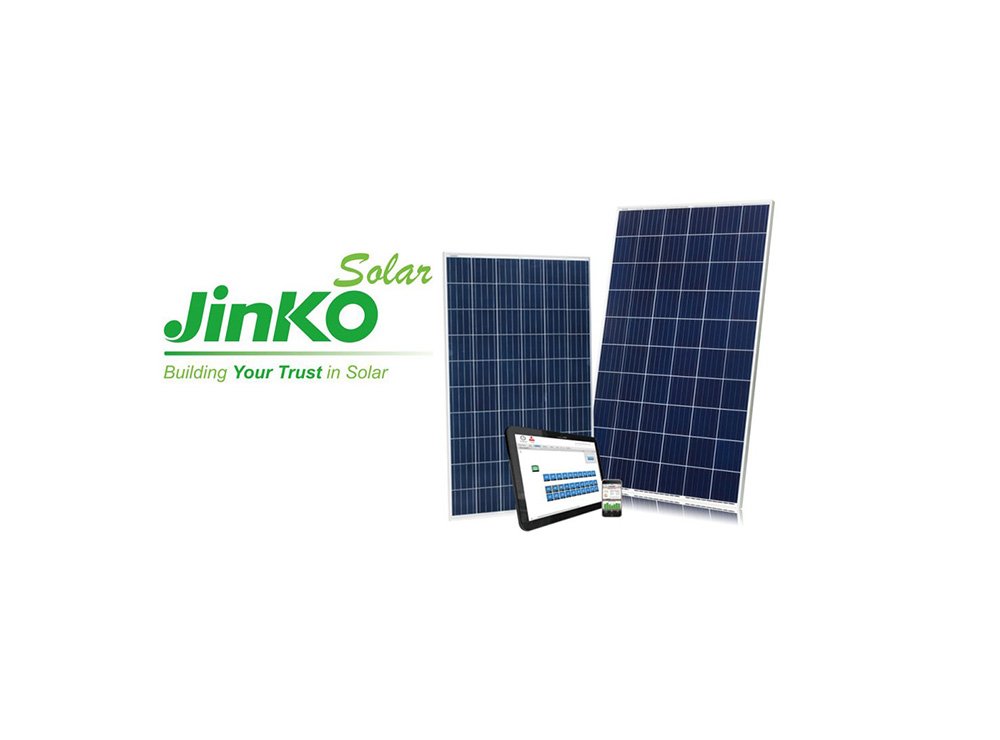 Solar panels and a control tablet with the Jinko Solar logo and slogan