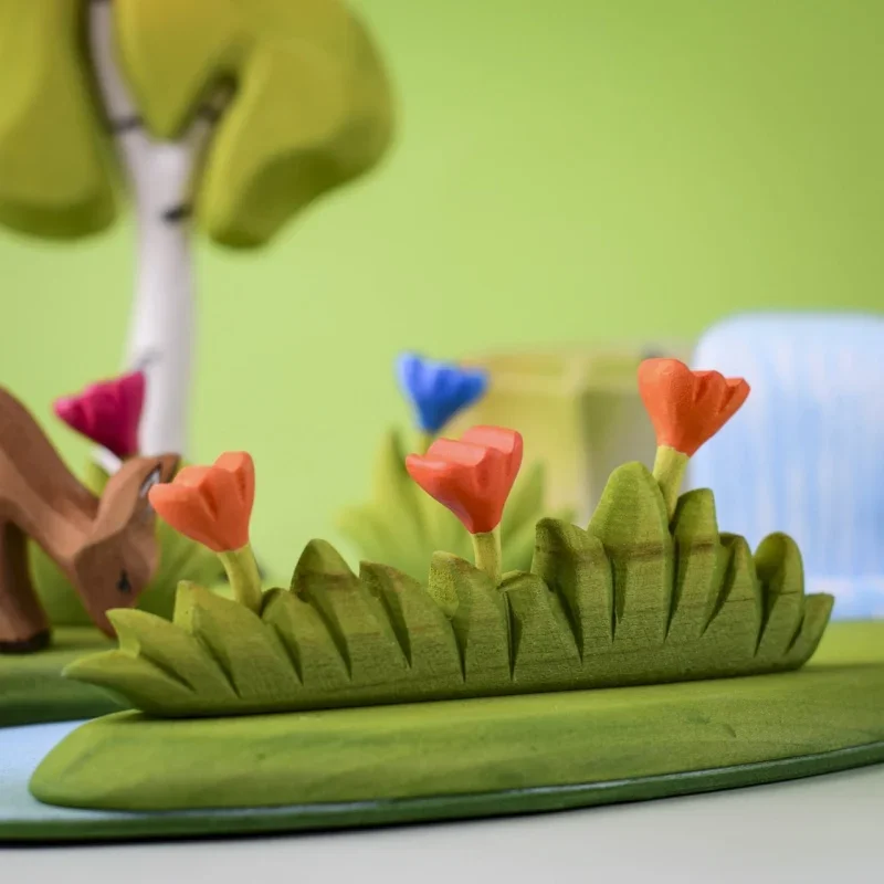 grass with orange flowers large bumbu toys treleker2.webp