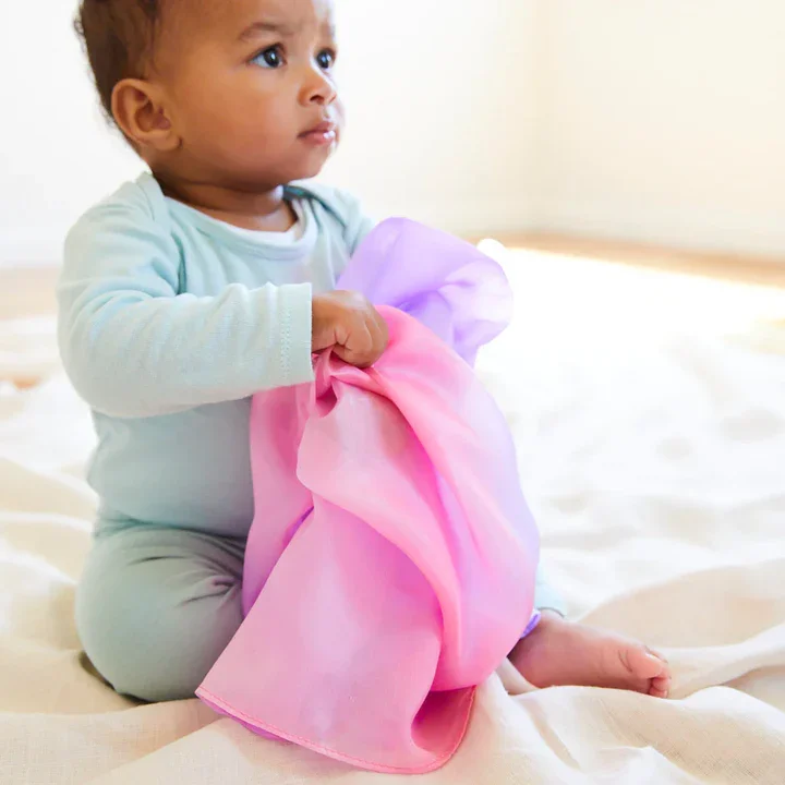 mini playsilk blossom baby holding.webp