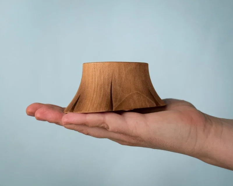 tree stump in hand bumbu wooden toys trestubbe