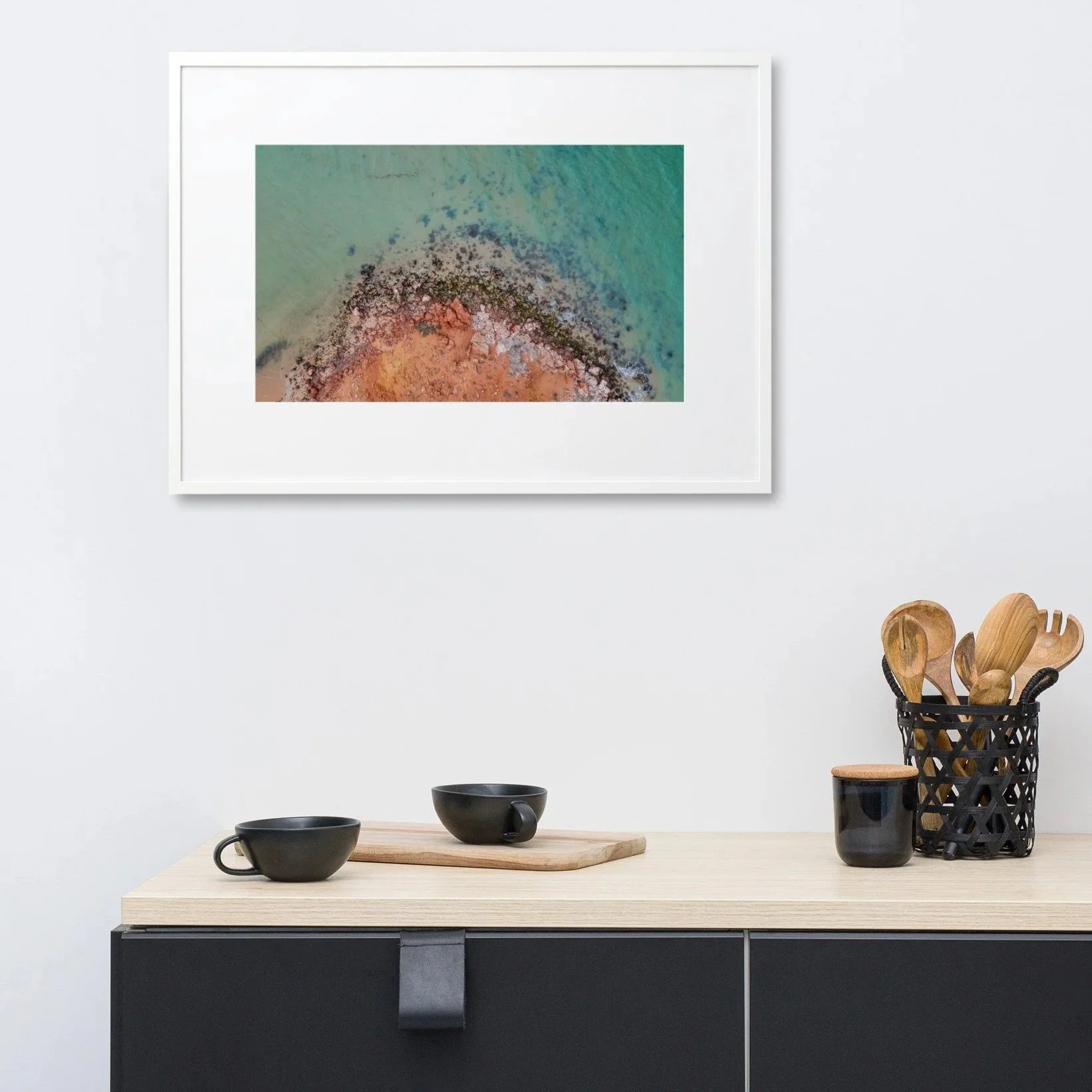Crimson Curve landscape wall art above buffet cabinet - Australian coastal framed print