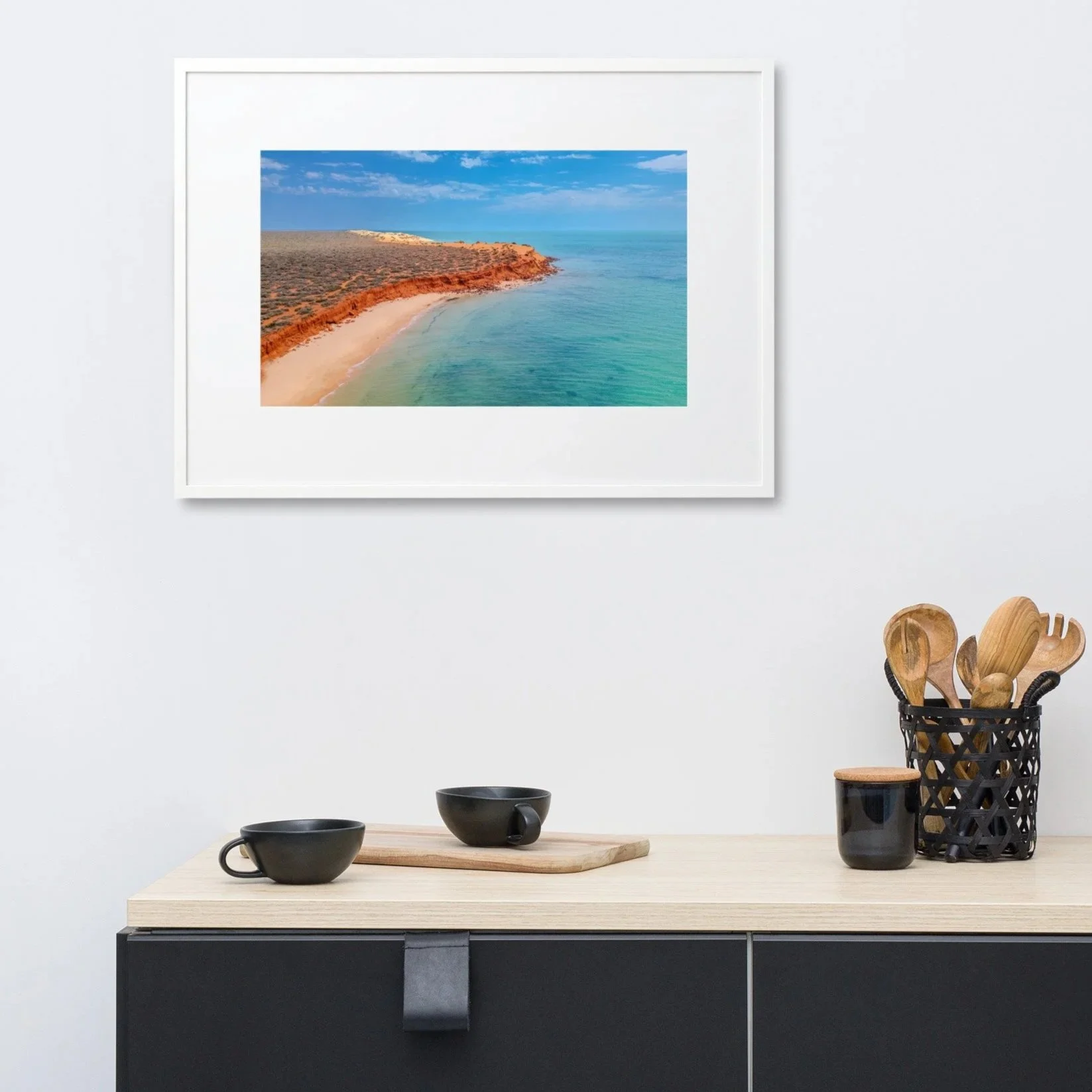 Coral Horizon framed print red cliffs and turquoise water above buffet in modern living room, Shark Bay WA