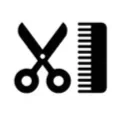 Pair of black scissors and a ruler on a white background