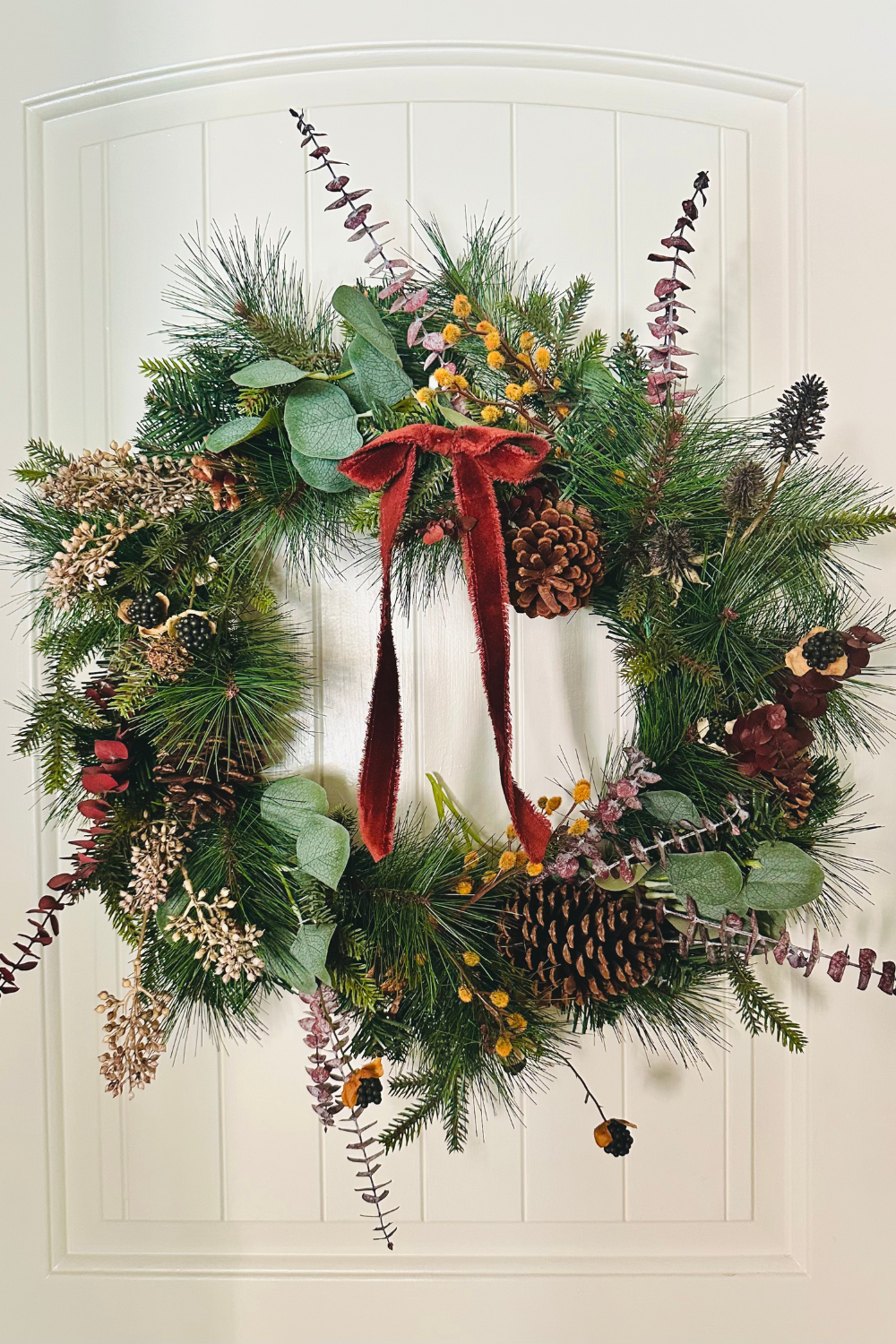 How to Transform a Basic Pine Wreath Into a Whimsical, Nature-Inspired Showpiece