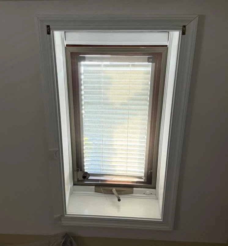 Older manual venting VELUX skylight before replacement in an Ocean City, NJ home