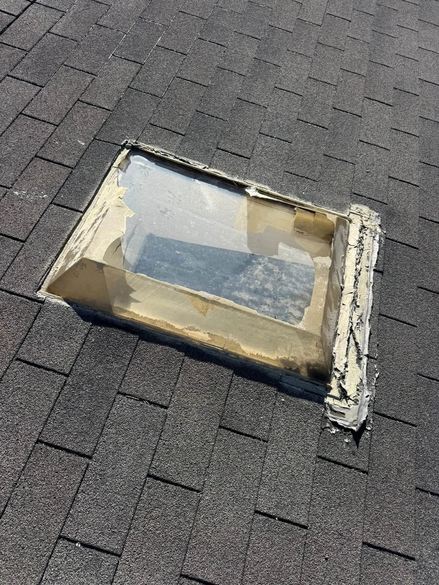 Damaged plastic skylight before replacement