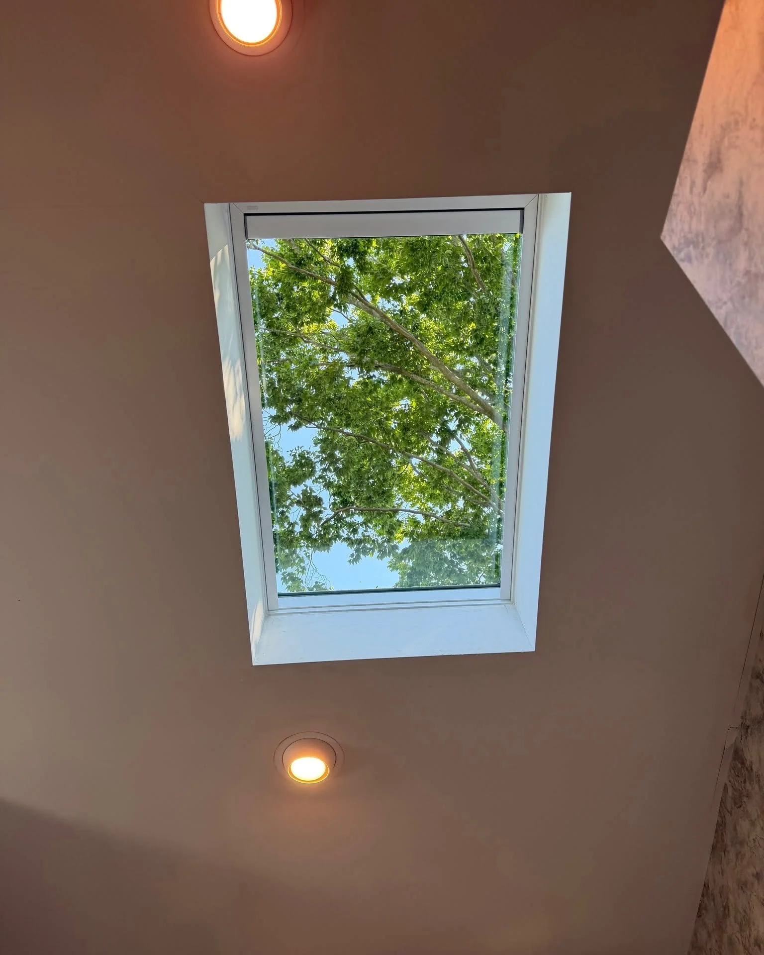 New skylight with clear glass restoring the outdoor view and natural light in a Cherry Hill, NJ home