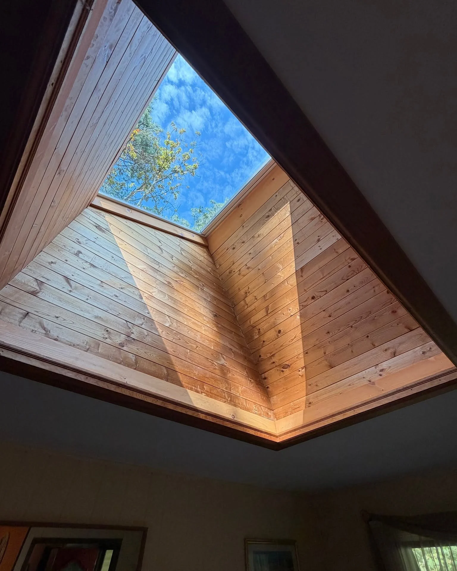 Restored interior trim around the new skylight after installation