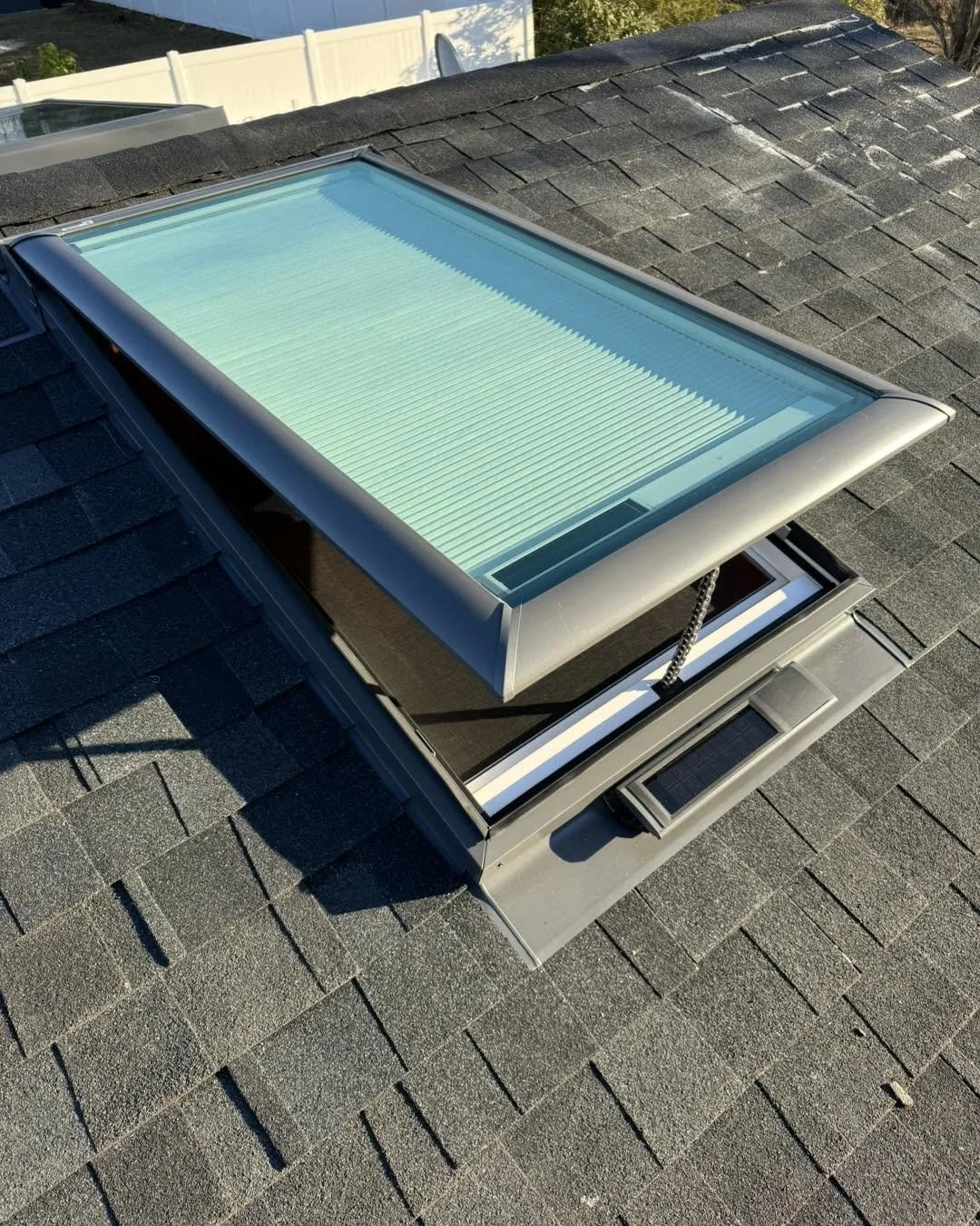 New solar-powered VELUX fresh air skylight with solar-powered blinds installed in Vineland