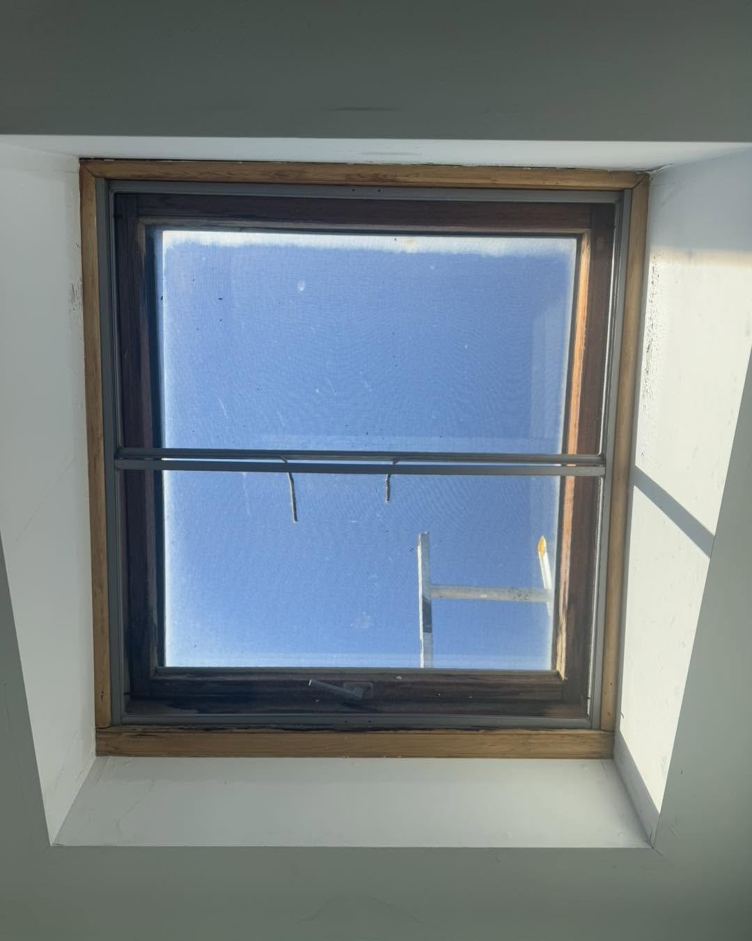 Outdated manual skylight before replacement
