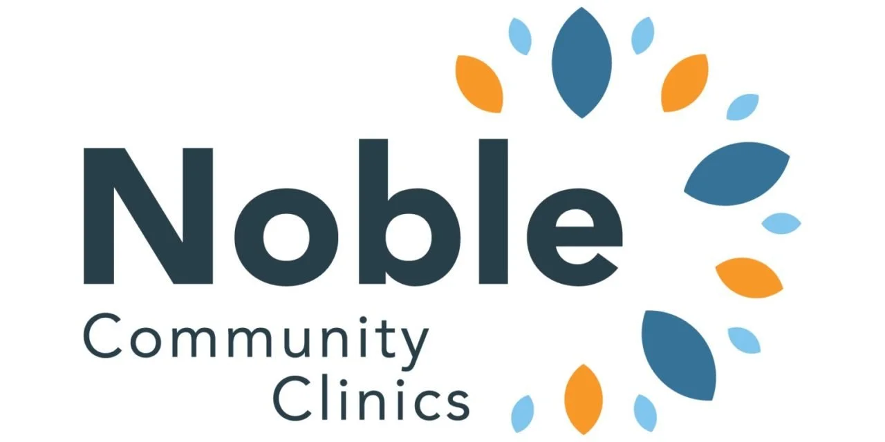 Logo of Noble Community Clinics featuring the word 'Noble' with stylized leaf and petal shapes in blue and orange around it.