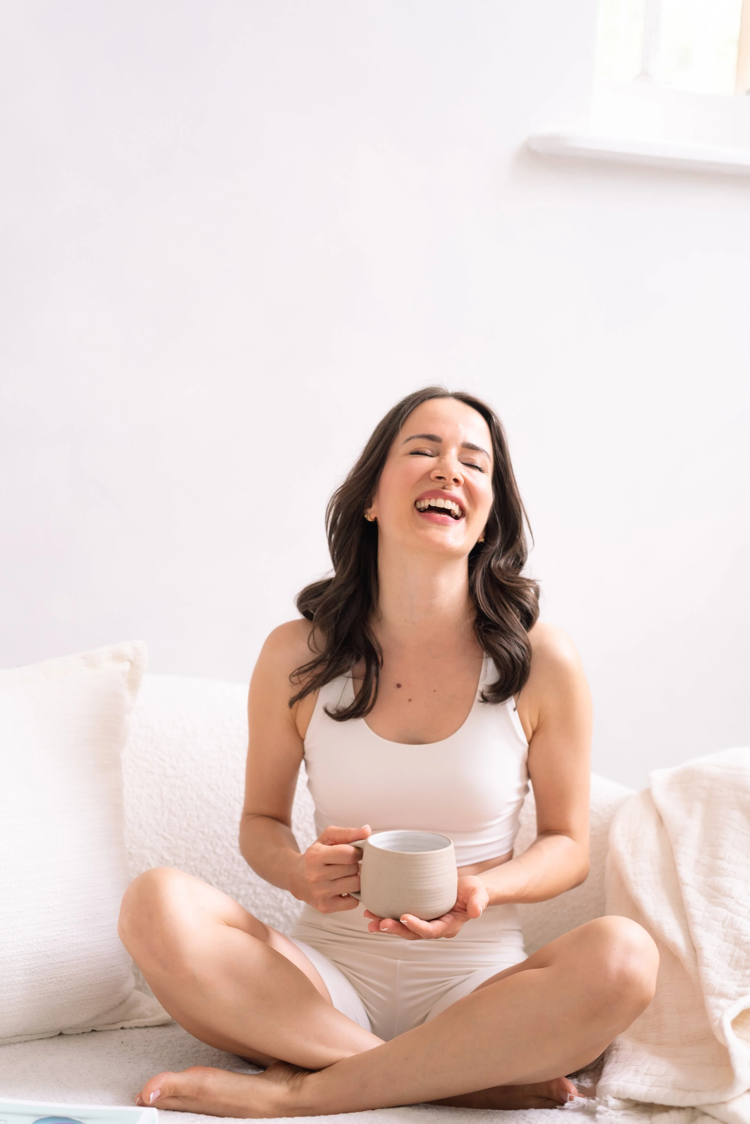 London brand photographer capturing authentic brand image of female founder in natural light