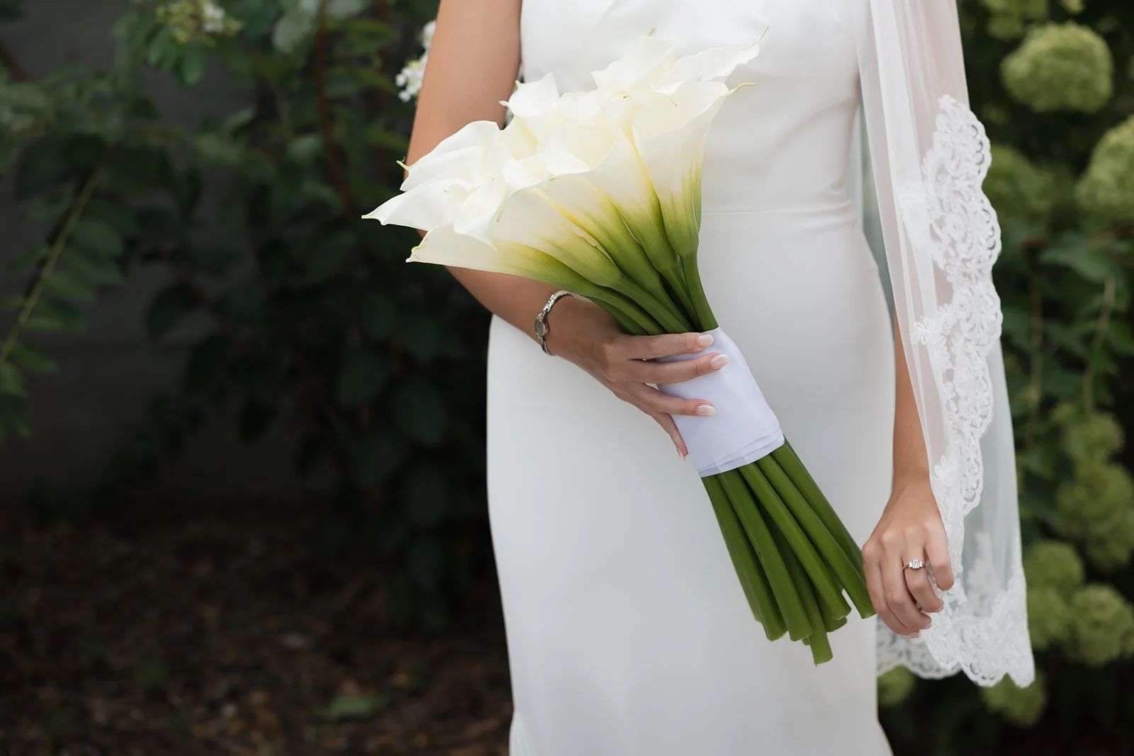 Bride holding Calla lily