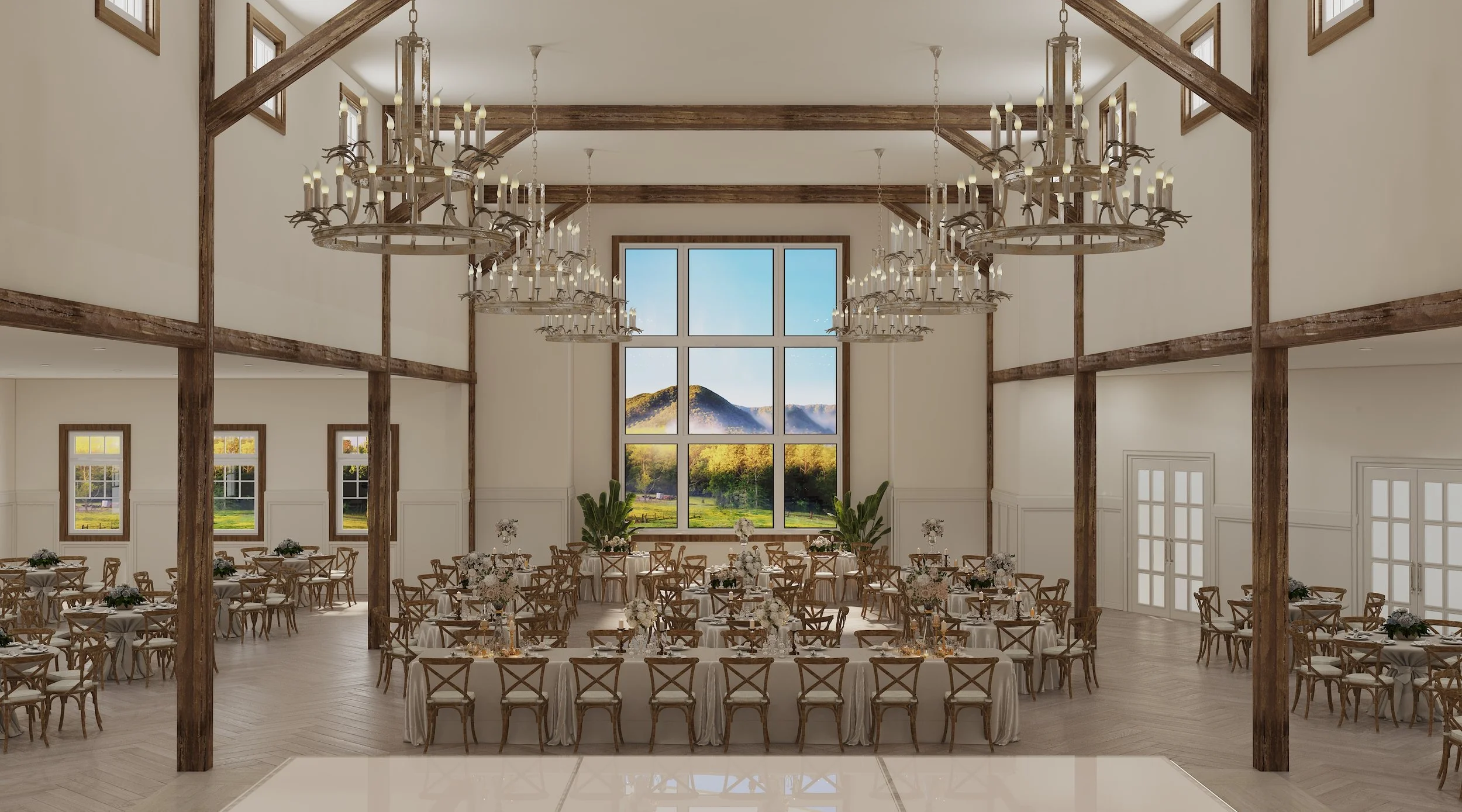 Elegant reception hall at The Lumigail featuring grand chandeliers, soaring ceilings, mountain-view windows, and timeless wedding reception seating for up to 300 guests.