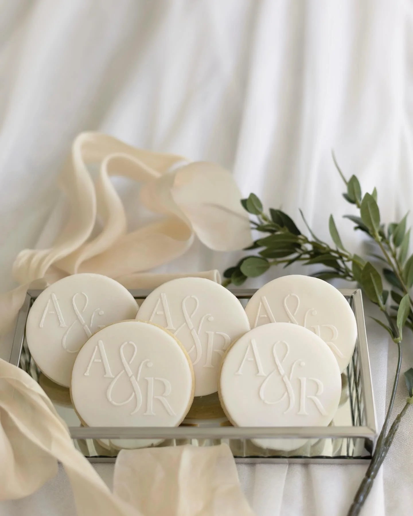 Bespoke Madagascan vanilla sugar cookies are the perfect favours to treat your wedding guests 🤍

They can be personalised with your initials, messages of love or cute like the love heart biscuits. 

Every detail of your wedding is discussed when I m