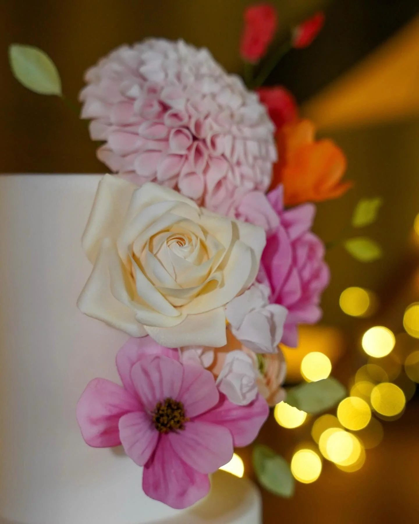 Making sugar flowers is the favourite part of my job. Usually I&rsquo;m drawn to soft pastel colours but I love it when I&rsquo;m pushed outside of my comfort zone with more vibrant colours which I created and used on this trio of wedding cakes. 

1s