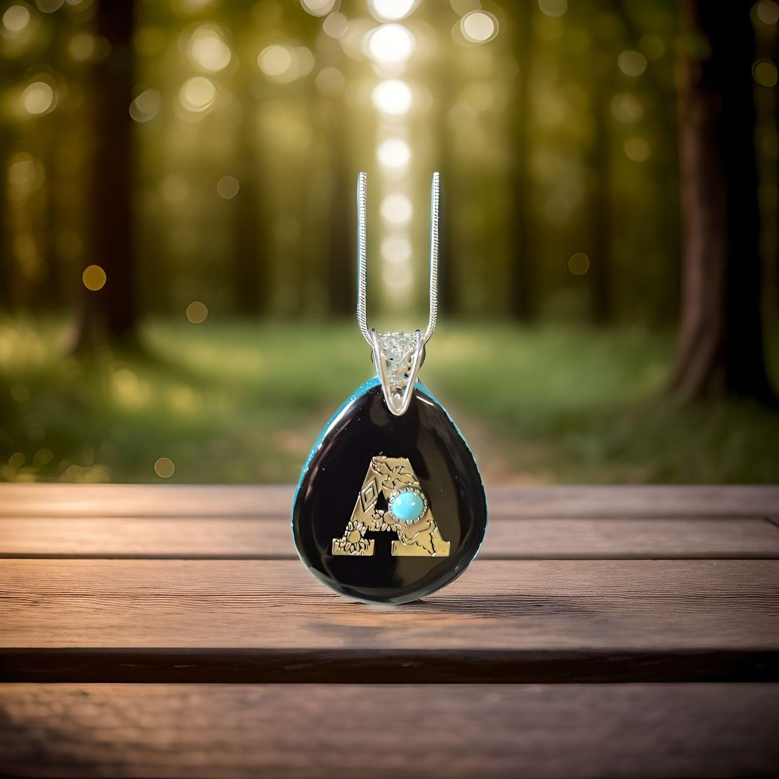 Two-Faced Initial Pendant — Black & Silver “A” + Aqua Opal Glow
