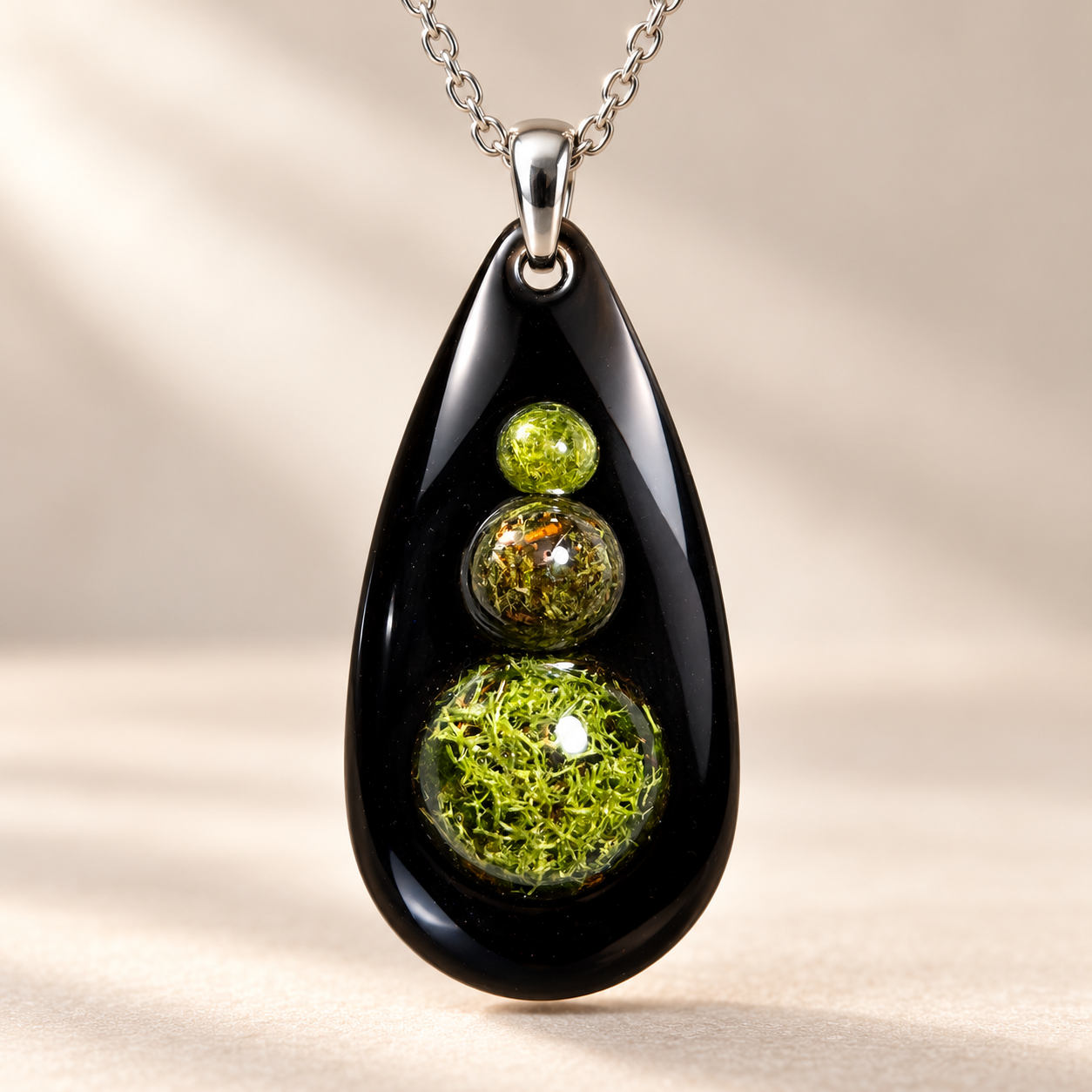Glossy Black Moss Orb Pendant.png