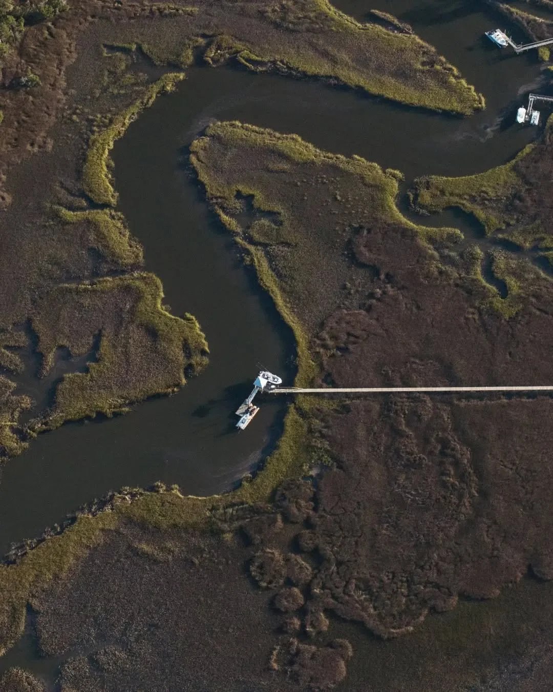 The kind of view that never gets old.
Our community dock tucked right into Nowell Creek -  a launching point for sunrise paddles, casting a line after dinner, and every &ldquo;let&rsquo;s just get out on the water&rdquo; moment in between.