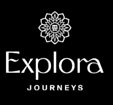 A logo with a decorative floral design at the top, the word 'Explore' in large font, and 'Journeys' in smaller font below.