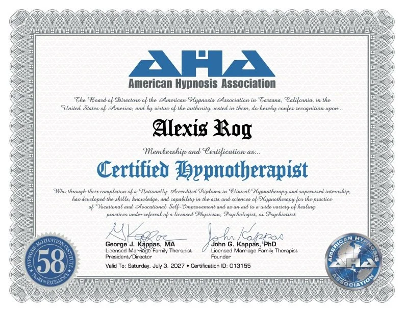 Certificate of membership and certification as a Certified Hypnotherapist from the American Hypnosis Association awarded to Alexis Rog, signed by George J. Kappas, MA, and John G. Kappas, PhD, dated July 3, 2027, with the association's logo and a 58th anniversary badge.
