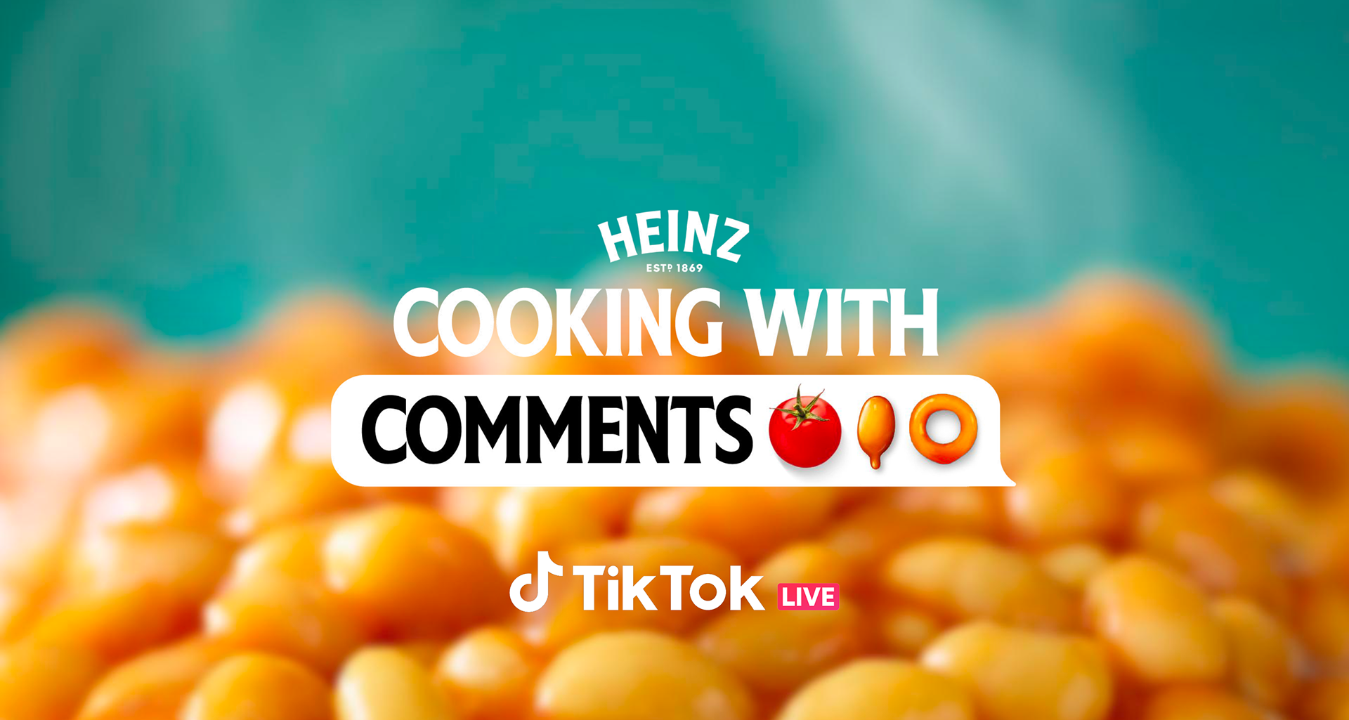 Colorful background with cooked corn kernels in the foreground. Overlaid text promotes a TikTok live cooking show about comments, featuring a tomato, spoon, and ring emojis.