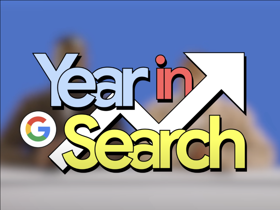 Graphic with the text 'Year in Search' and a Google logo, featuring an upward trending arrow.