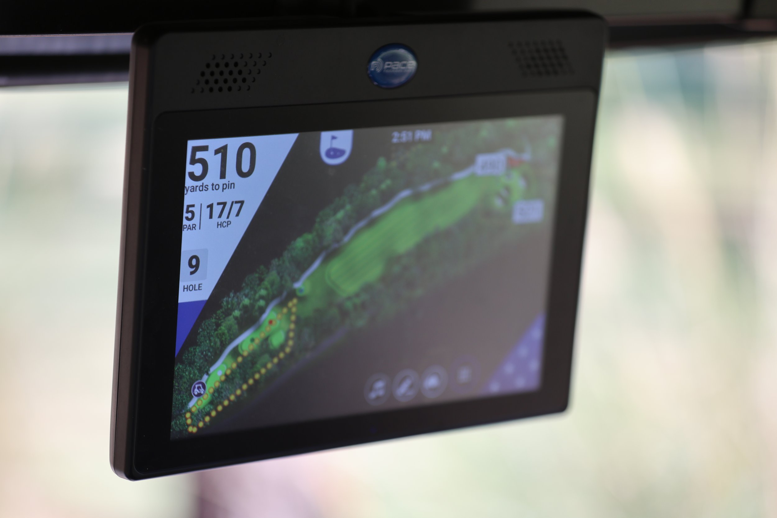 Golf course GPS device showing hole 9, 510 yards to pin, par 5, 17/7 handicap, with map of the hole layout.