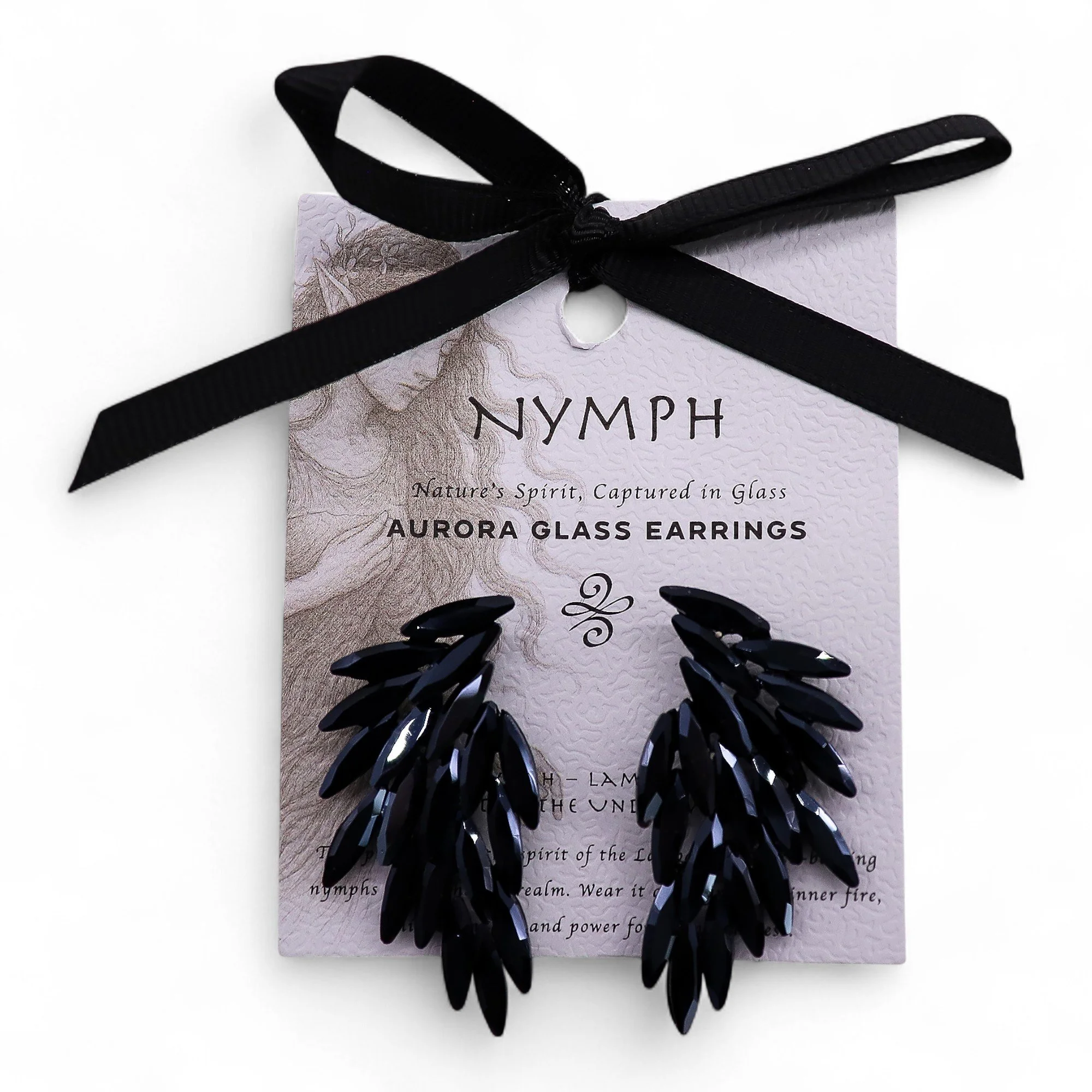 The Nymph Aurora Glass Earrings collection is inspired by mythical spirits of nature - each pair designed to capture the grace of sea, forest, dusk, and shadow nymphs. 🧚&zwj;♀️🧜&zwj;♀️

Made from stainless steel with glass accents, these earrings o
