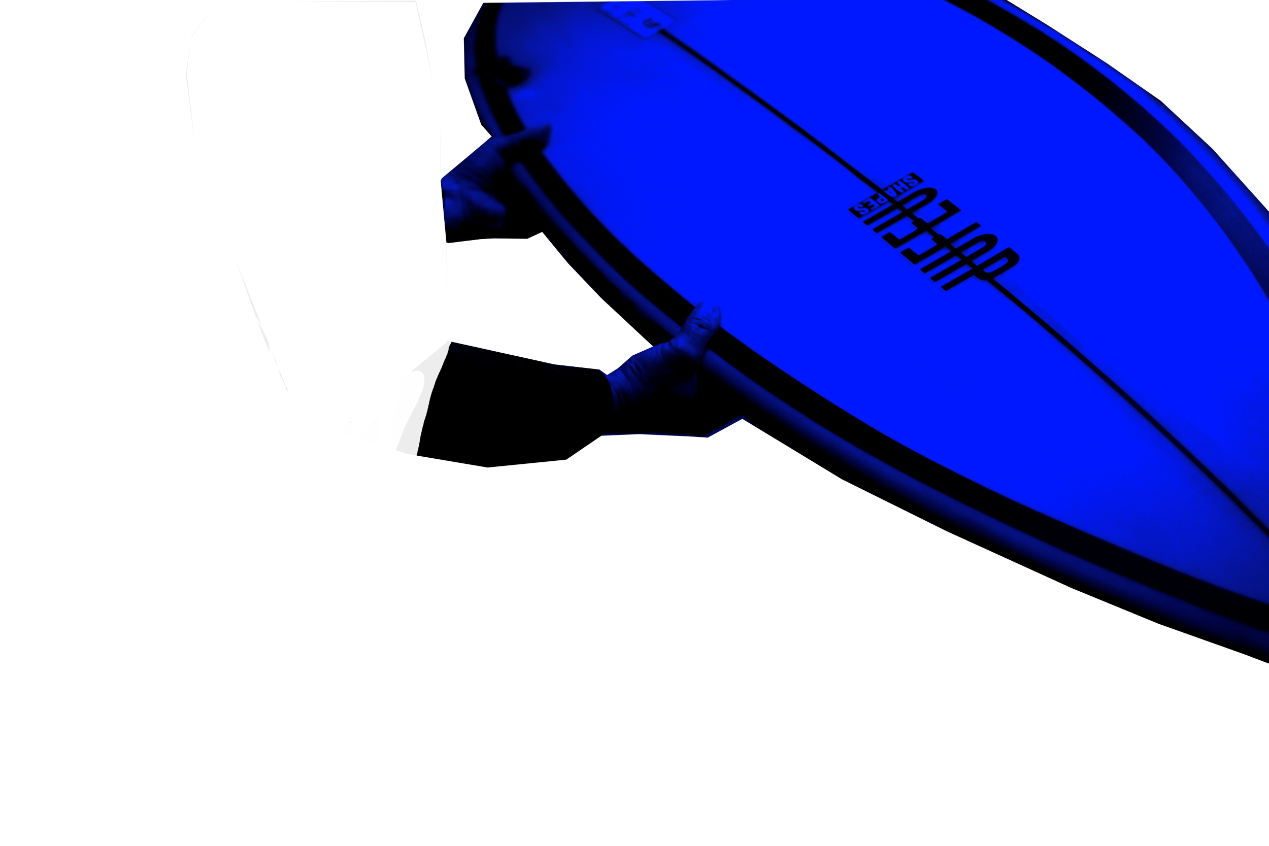 Person holding a surboard with a blue tint.