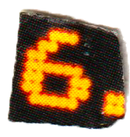 Close-up of a digital display showing the number 6 in orange pixels against a black background.