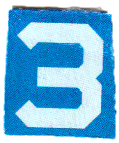 A blue rectangular sign with the number three in white and blue
.