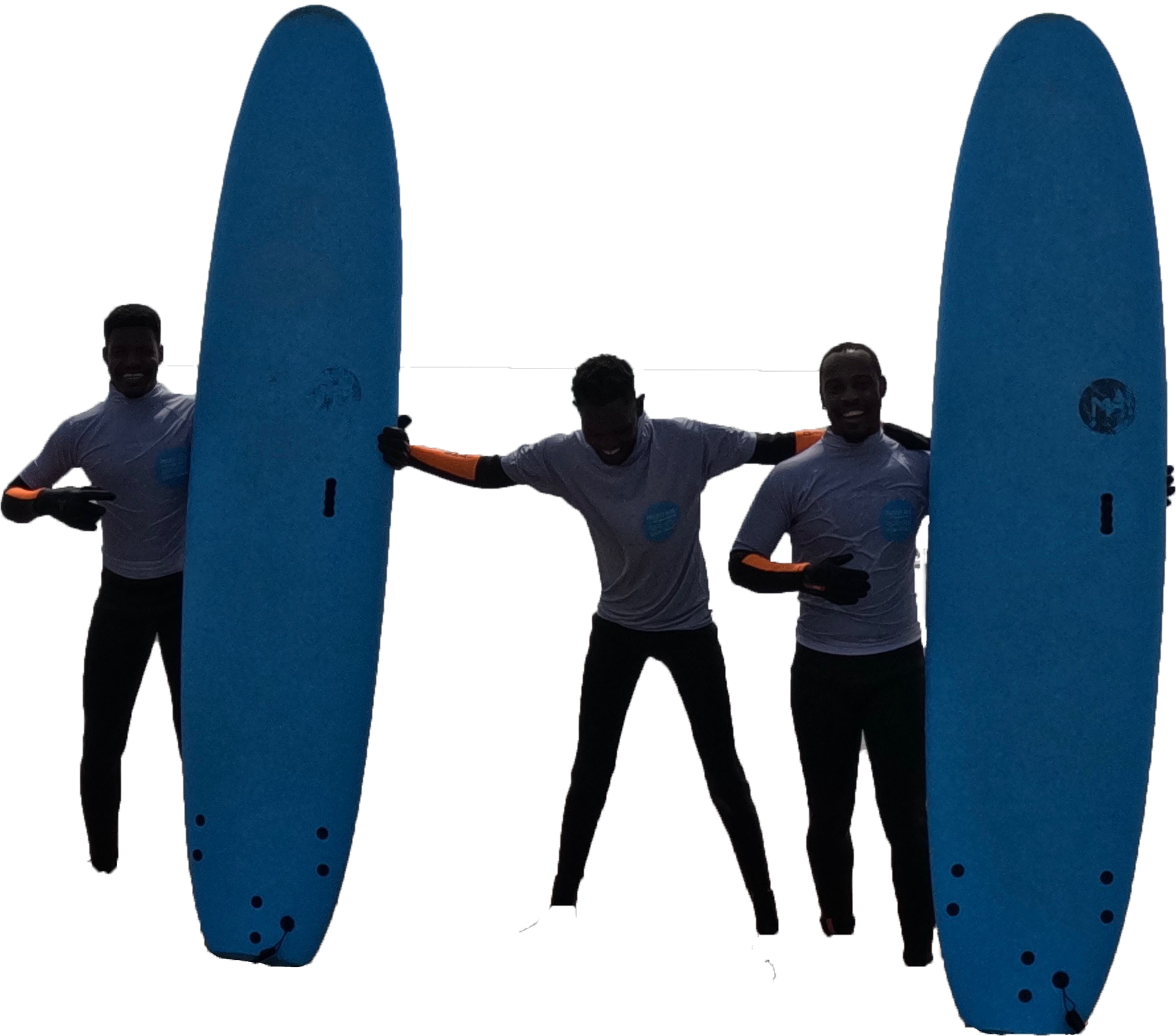Three people holding large blue surfboards and smiling, standing outdoors.