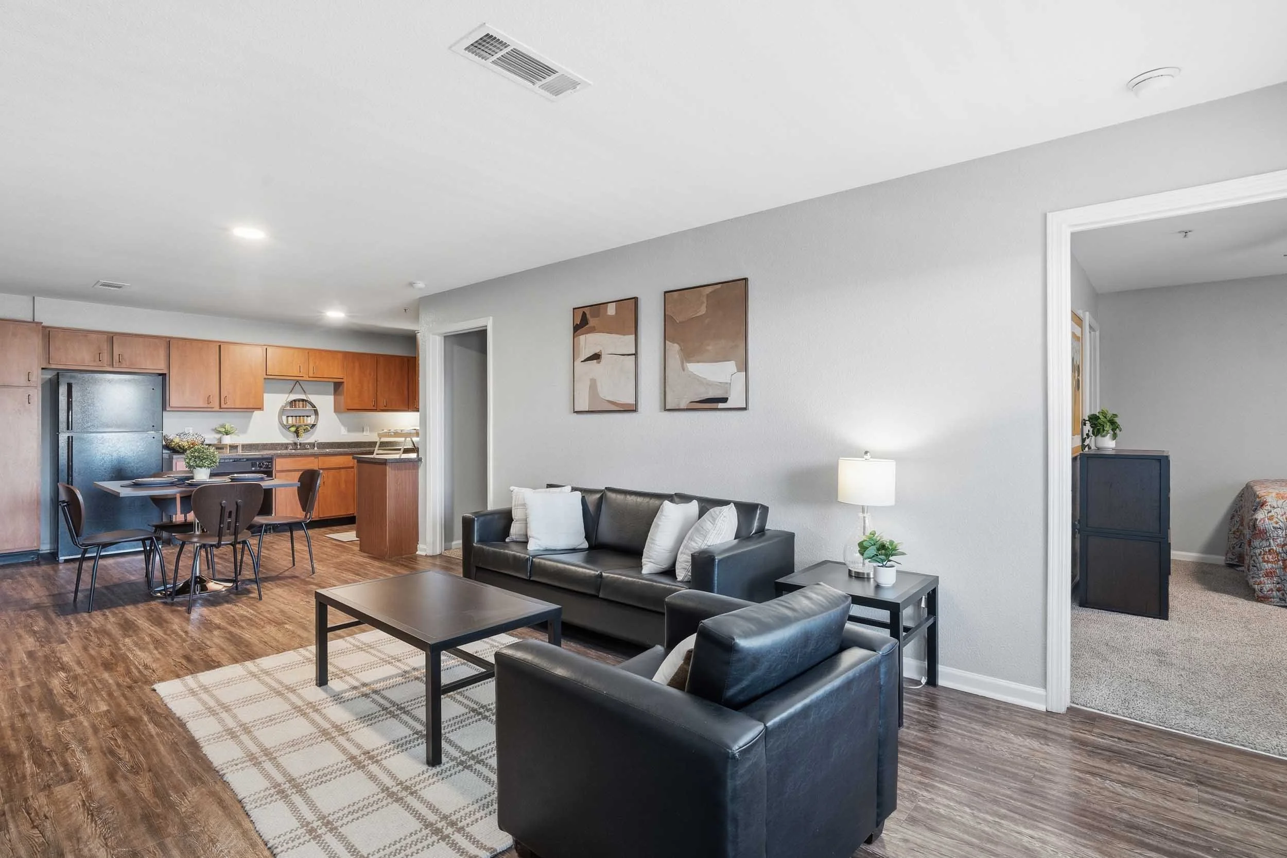 Arc225 | Student Apartments near LSU | Living Room and Kitchen