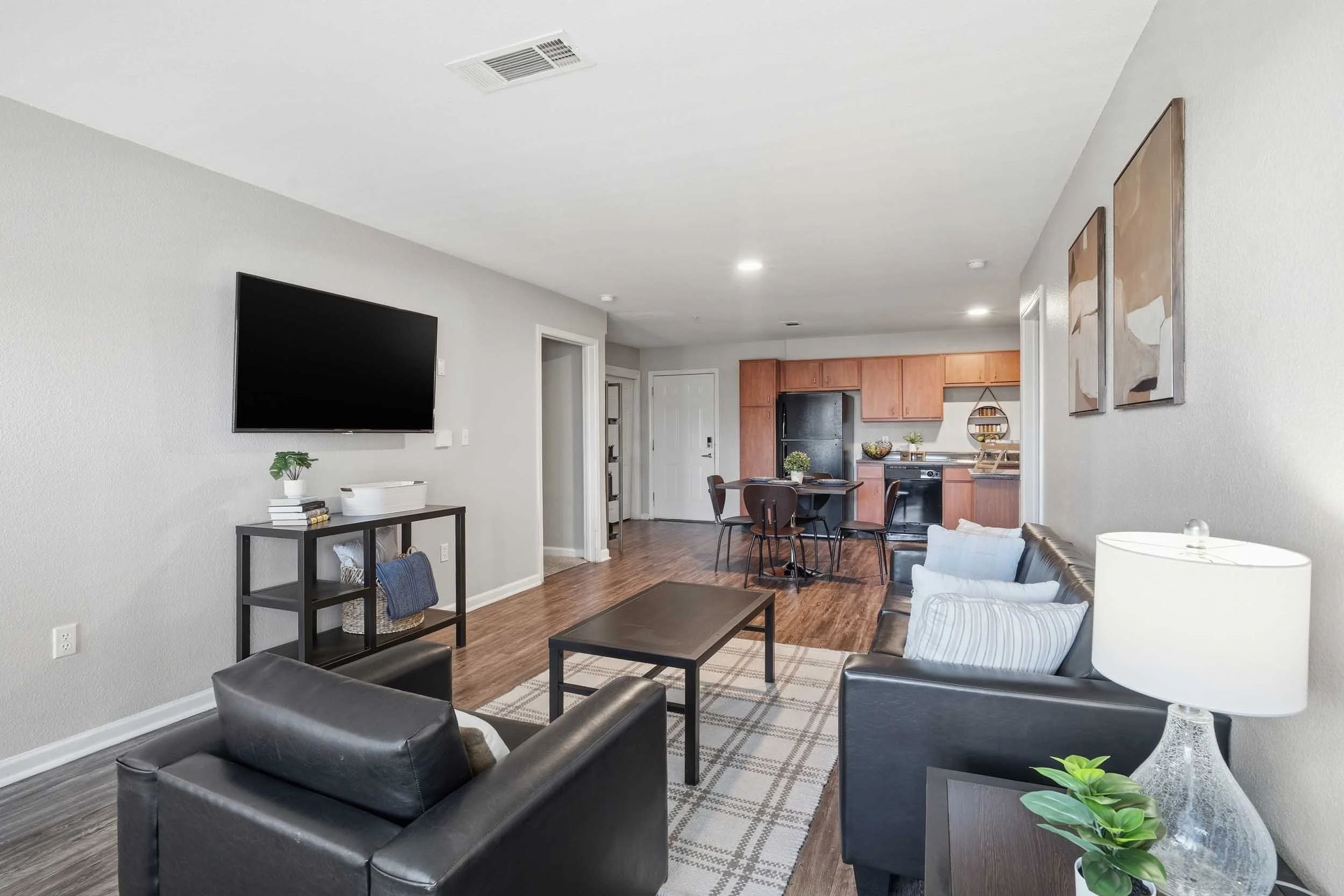 Arc225 | Student Apartments near LSU | Living Room and Kitchen